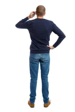 Back view of  pointing young men talking on cell phone Stock-Fotos