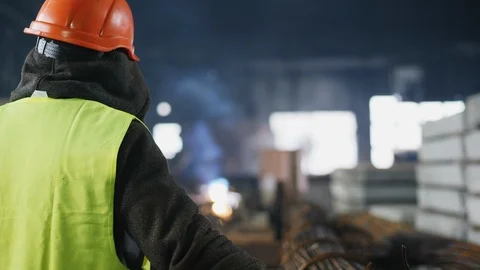 Back view portrait of a worker in the hardhat Stock Footage 104109873