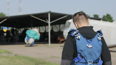 Back view of professional skydiver in a suit Stock Footage 133336144