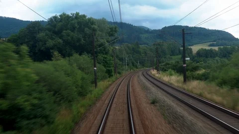 Back view of railroad train branching pass with beautiful green nature and Stock Footage 114383002