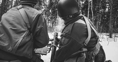 Back View On Re-enactors Dressed As American Infantry Soldiers Fire From Stock Photos
