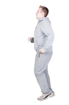 Back view of running athlete man in tracksiut 스톡 사진