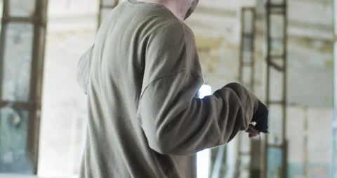 Back view of a scary zombie walking in the abandoned building in search of food Stock Footage 134942785