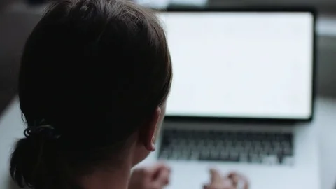 Back view of scientist working on laptop Vídeo Stock 70152804