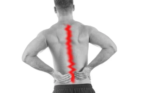 Back view of a shirtless man with lower back pain Stock Photos