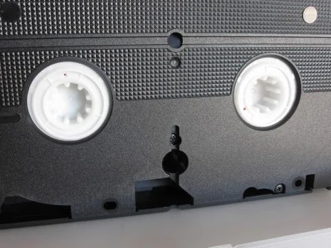 Back view of a single outdated videocassette . Old video tape Stock Photos