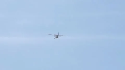 Back view of small private turbo prop airplane flying away. Stock-Footage 153239251