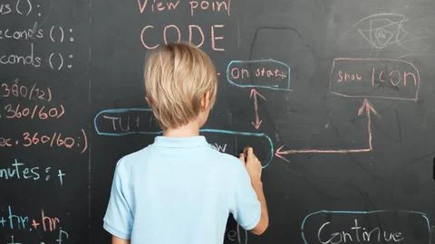 Back view of smart student writing engineering prompt on blackboard. Erudition. Stock-Fotos
