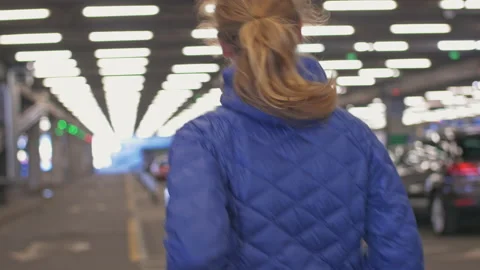 Back view of sporty runner jogging in the city Stock Footage 133285165