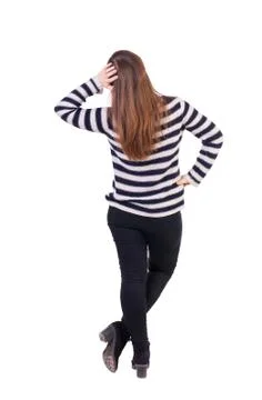 Back view of standing young beautiful  woman Stock Photos