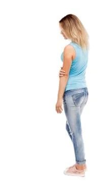 Back view of standing young beautiful  woman Stock-Fotos
