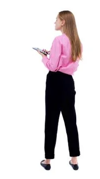 Back view of standing young beautiful  girl with tablet computer Stock Photos