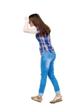 Back view of standing young beautiful  woman Stock-Fotos
