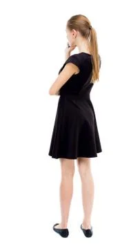 Back view of standing young beautiful  woman Stock-Fotos