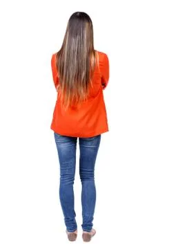 Back view of standing young beautiful  woman Stock Photos