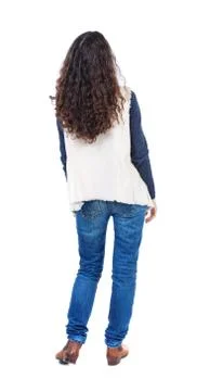 Back view of standing young beautiful  woman Foto stock