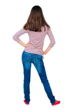 Back view of standing young beautiful  brunette woman Foto stock