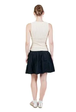 Back view of standing young beautiful  woman Foto stock