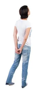 Back view of standing young beautiful  brunette woman Foto stock