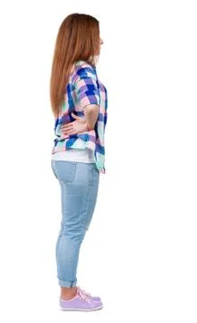 Back view of standing young beautiful redhead woman Stock Photos