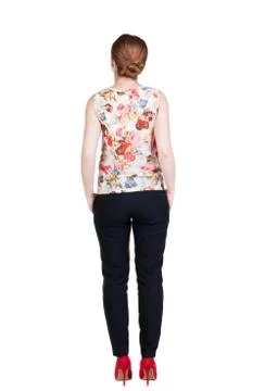 Back view of standing young beautiful  redhead woman Stock-Fotos