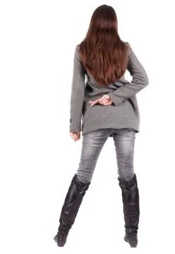 Back view of standing young beautiful  woman Stock Photos
