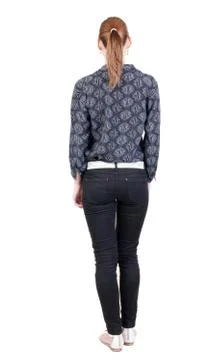 Back view of standing young beautiful  brunette woman Stock Photos