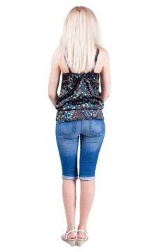 Back view of standing young beautiful  blonde Stock Photos