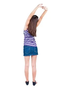Back view of standing young beautiful  woman thumbs up Foto stock