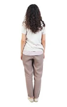 Back view of standing young beautiful  woman Stock Photos