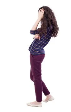 Back view of standing young beautiful  woman Stock Photos