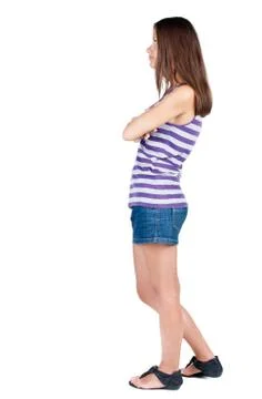 Back view of standing young beautiful  brunette woman Stock Photos