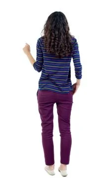 Back view of standing young beautiful  woman Foto stock
