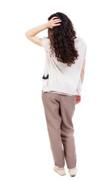 Back view of standing young beautiful  woman Foto stock