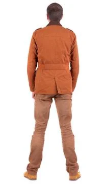 Back view of stylishly dressed man in a brown jackett  looking u Stock Photos
