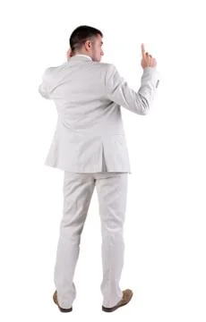 Back view of  thinking young business man in  white suit Stock Photos
