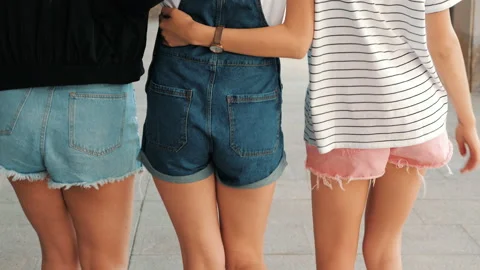 Back view of three young female hipster friends. Sexy girls Stock Footage 141788305