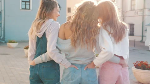 Back view of three young female hipster friends Stock Footage 141804229
