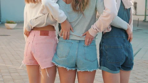 Back view of three young female hipster friends Stock Footage 141804441