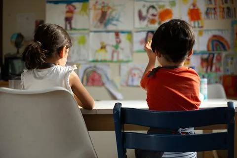 Back view of two sisters preparing food at home 스톡 사진