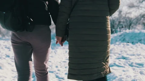 Back View of Two Women Walking Hand in H... | Stock Video | Pond5