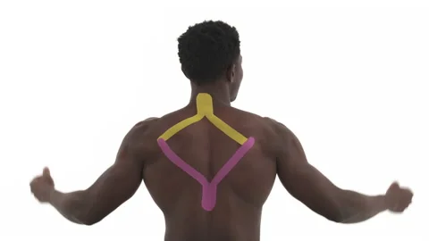 Back view of unrecognizable African athlete lifting hands up, demonstrating Stock Footage 133772677