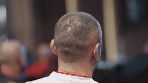 Back view of unrecognizable business man at a professional conference seminar Stock Footage 323390131