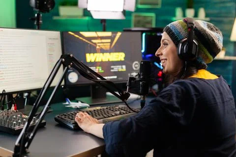 Back view of upseted streamer playing game competition Stock Photos