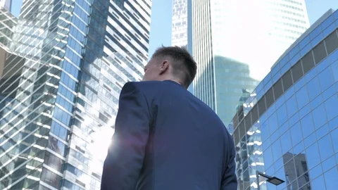 Back view of Walking Businessman Stock-Footage 94052121