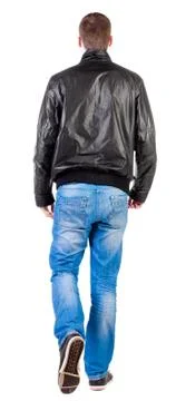 Back view of walking handsome man in jacket Foto stock