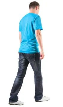 Back view of walking handsome man in t-shirt Stock Photos