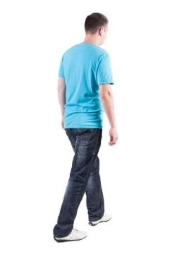 Back view of walking handsome man in t-shirt Foto stock