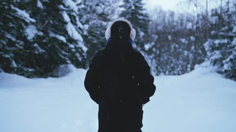 Back view of walking in the snow and close-up of walking in the snow Video stock 301601217