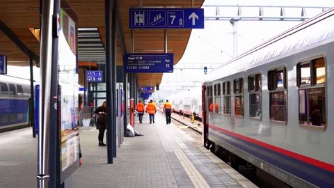 Back view of walking technicians in the station, trying to solve the problem Stock-Footage 159292387